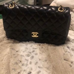 NOT AUTHENTIC. Chanel fashion bag. Very good condition